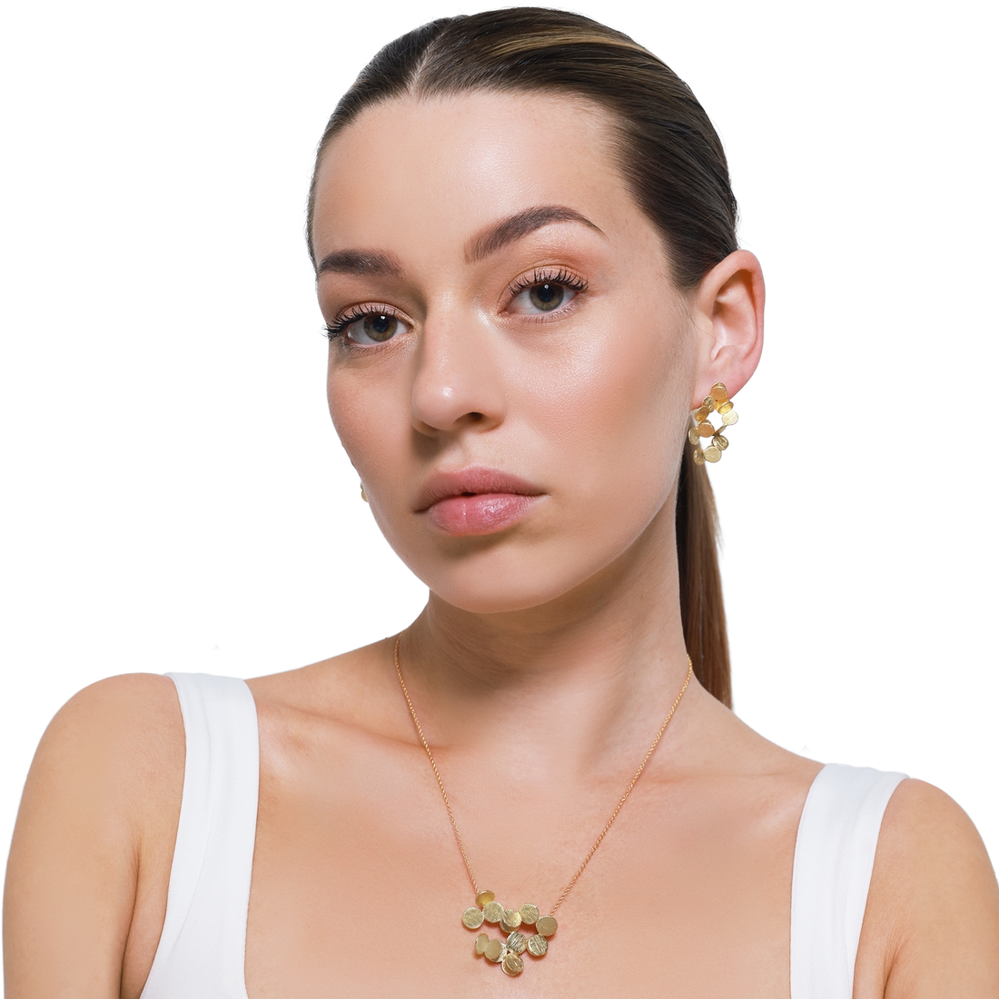 Eleganter Goldschmuck für Damen mit Ohrringen und Halskette